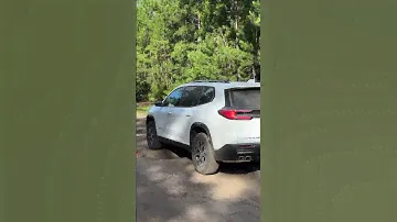 2024 GMC Acadia AT4 tackling terrain in Terrain Mode